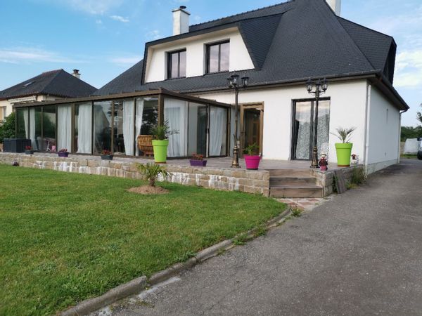 Belle maison avec grande véranda