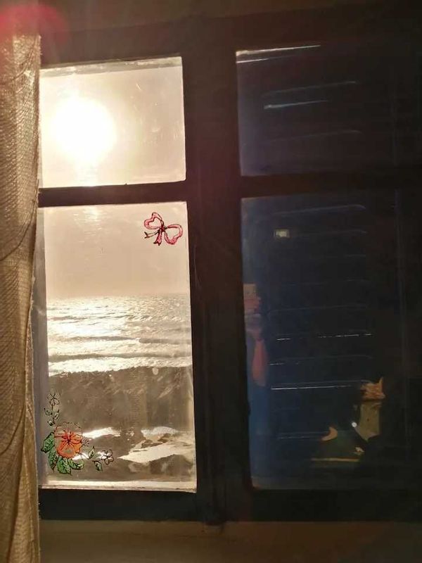 Cabane de pêcheur avec vue sur mer