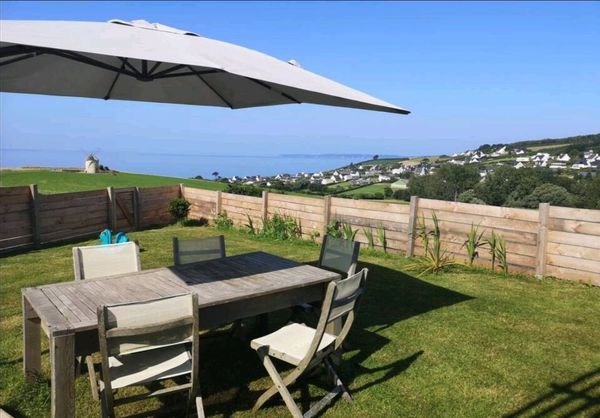 Maison bois vue sur mer Début juillet.