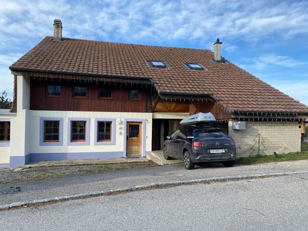 Maison dans la campagne fribourgeoise