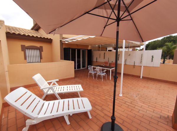 Appartement de vacances avec une superbe terrasse donnant sur le terrain de golf à Islantilla (Huelva)