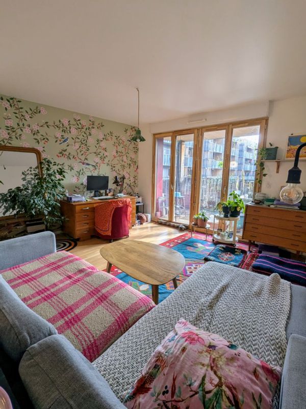 Appartement sur une île et dans un immeuble en bois