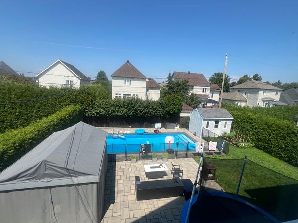 Sous-sol privé avec piscine chauffée (été), cour et accès rapide Montréal & nature