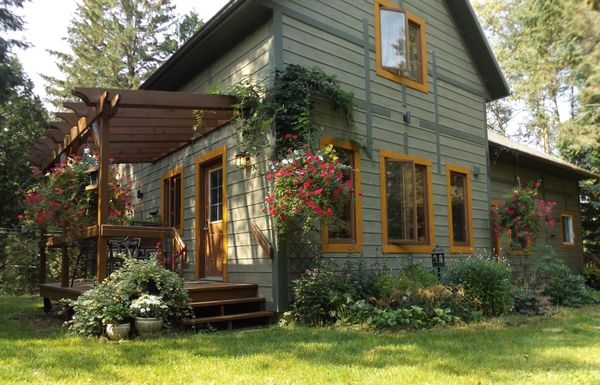 Chalet avec spa et petit lac privé en Beauce