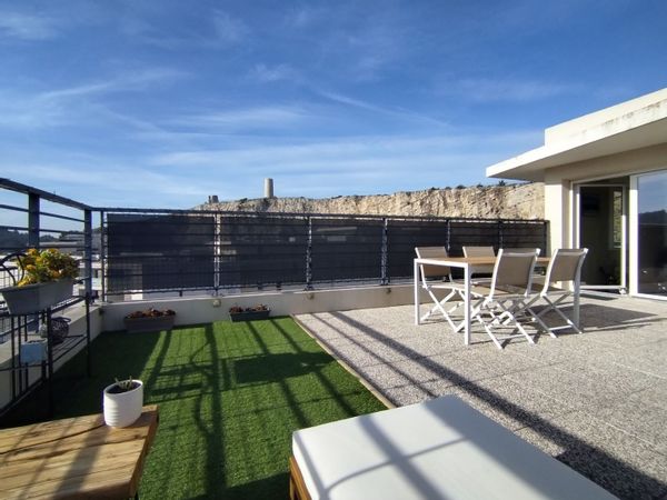 Appartement avec grande terrasse en dernier étage