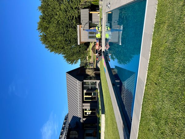 Lake and Pool Front Farm Home