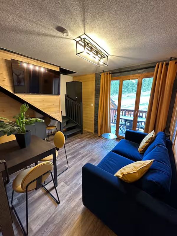 Duplex 2 chambres, vue pistes, parking privé et piscine