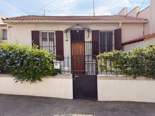 Maison de ville avec terrasse et jardin
