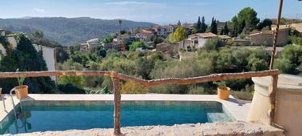 Cottage avec piscine dans les montagnes avec vue sur la mer à Mallorca