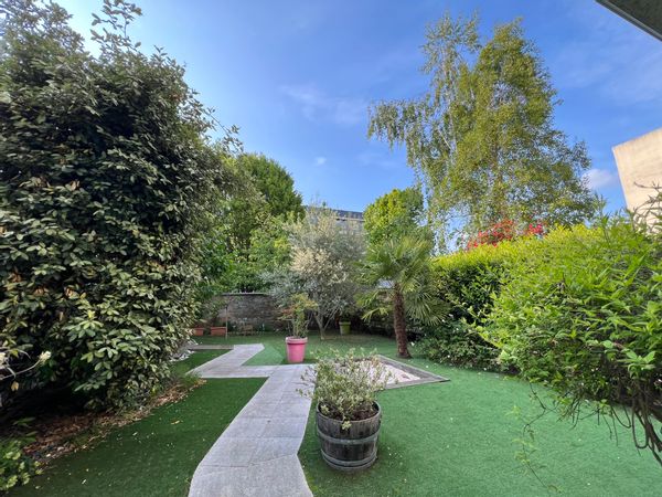 “Appartement avec un jardin privatif a quelques minutes de Paris »