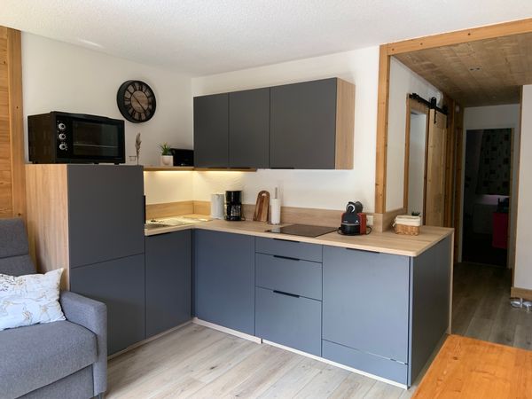 L’appartement de Christian départ skis aux pieds.