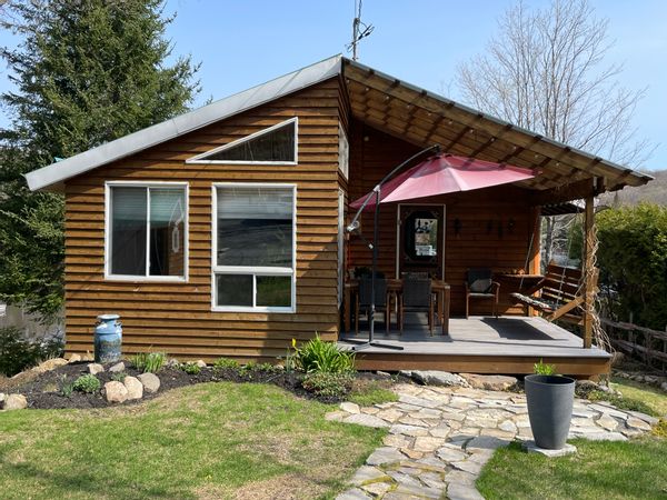 La maison de Richard Chalet sur le bord du lac navigable