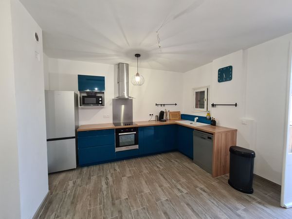 Appartement en plein centre avec garage privé.