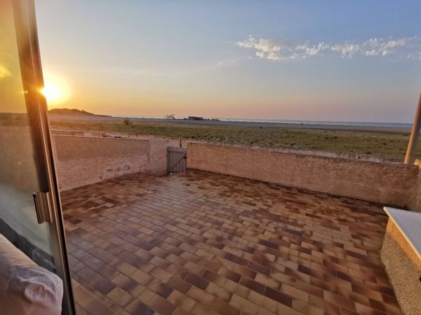 Appartement en bord de mer d'une plage immense et dynamique