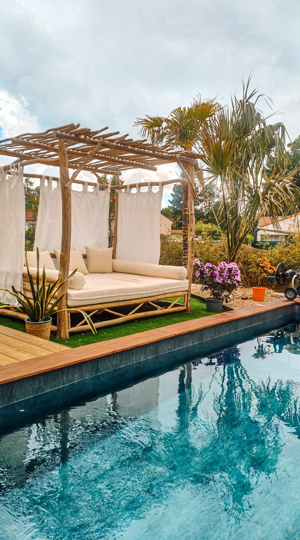 Maison de 2024, ambiance vacances à Bali avec ses palmiers et sa décoration bohème.  Piscine privée