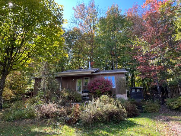 Chalet à Orford, nature et foyer au bois