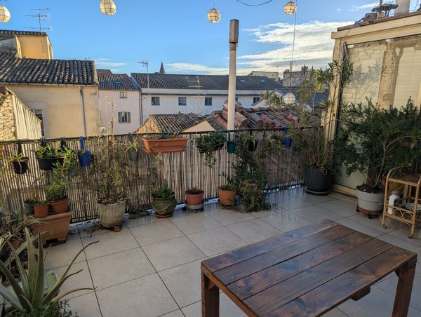 Appartement avec terrasse vue sur les toits