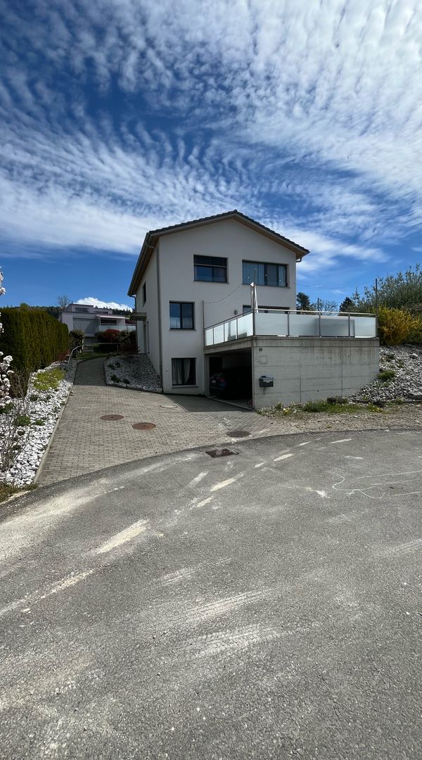 Bright modern family home with large garden in a quiet area, walking distance to village amenities.
