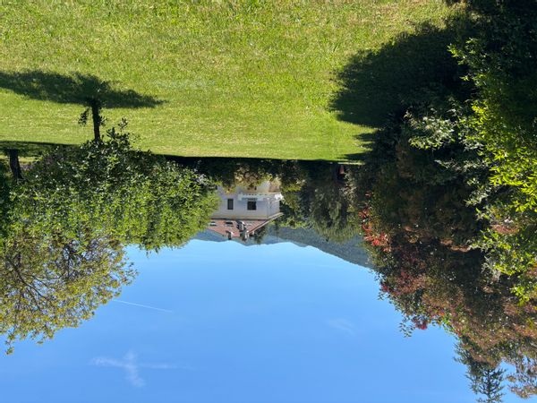 Maison avec parc verdoyant
