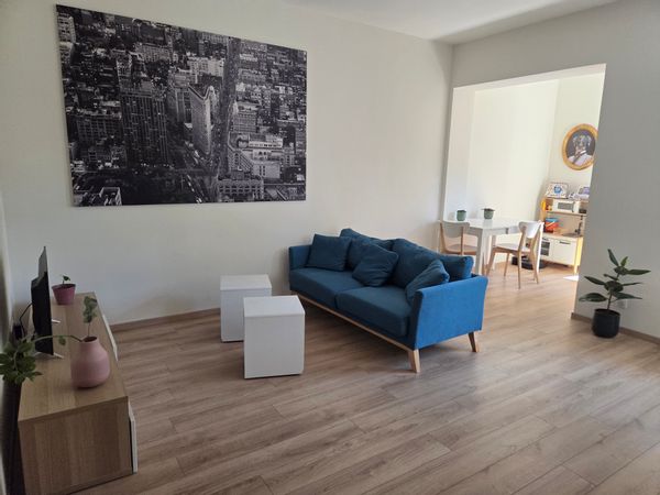 Appartement familial idéalement situé face à la gare et à deux pas du centre-ville