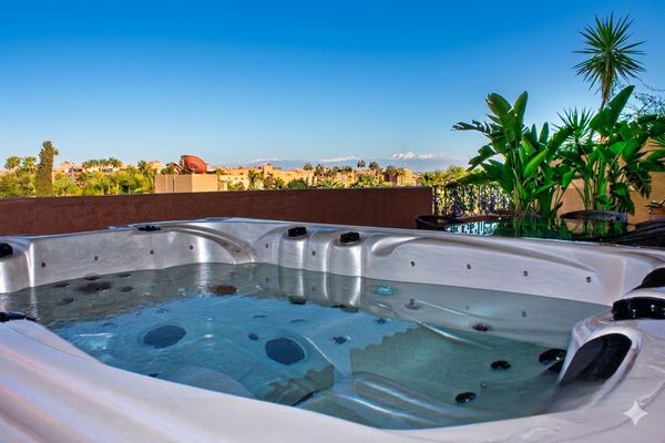 Appartement 130 m2 dernier étage avec jacuzzi et vue sur les jardins de Majorelle.