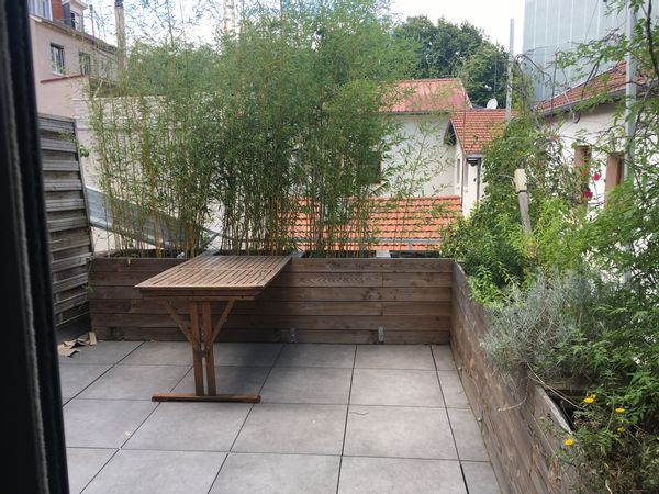 Appartement de charme 2 chambres + terrasse et jardin à Villeurbanne