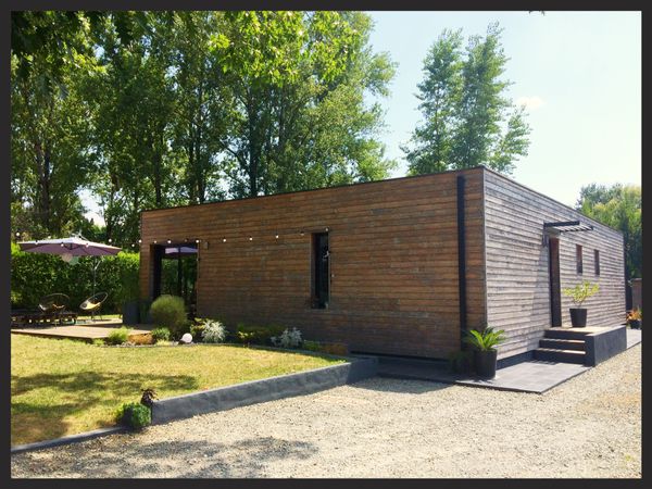 Maison en bois avec patio aux portes de Bordeaux.