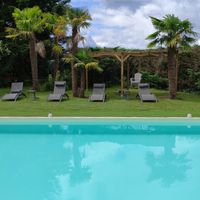Studio avec piscine dans un grand parc arboré